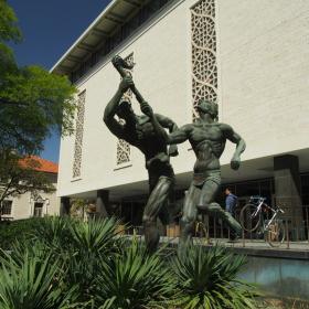 Statue in front of Flawn Academic Center